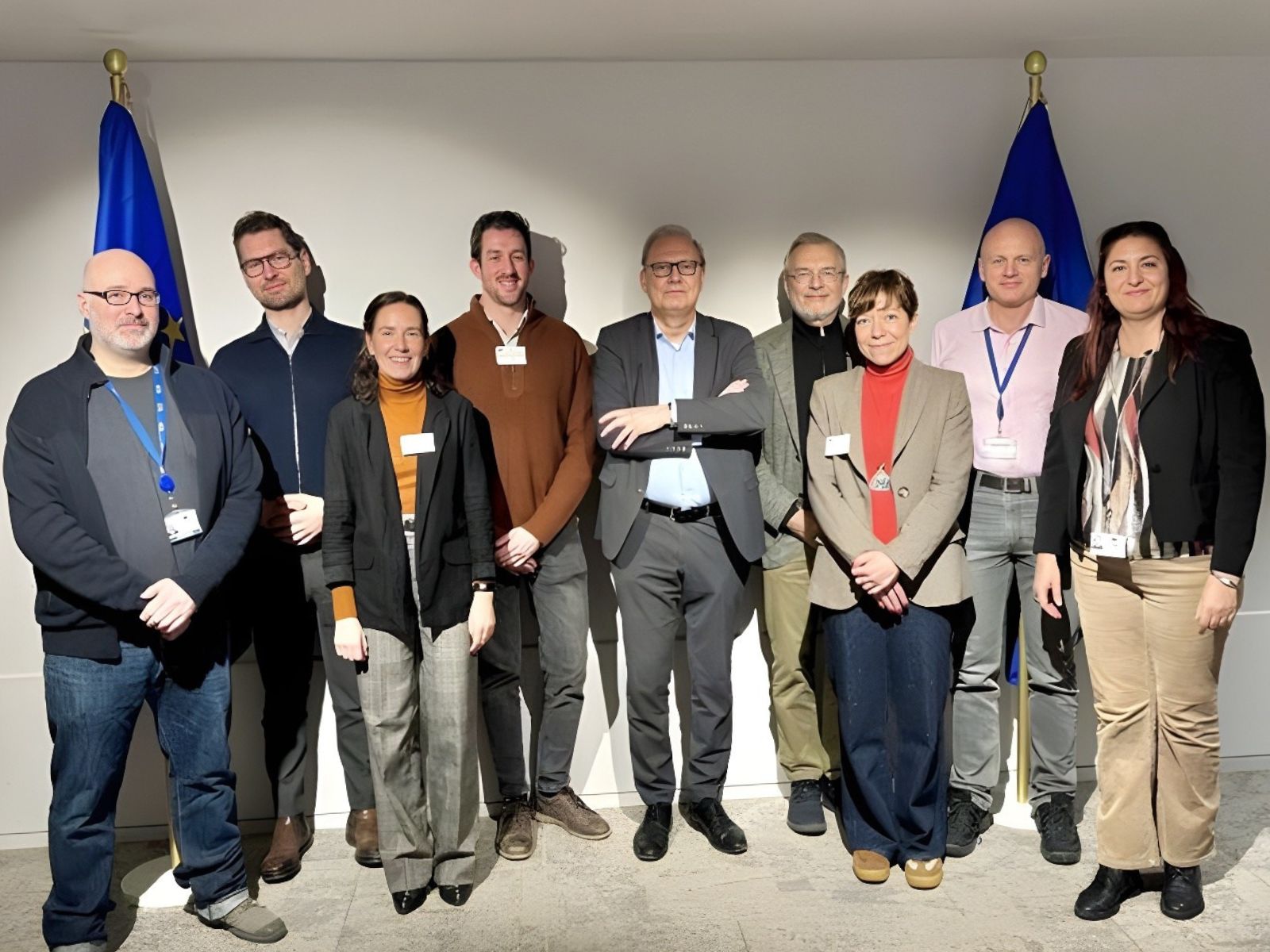 Taric and DG Trade teams alongside Peter Berz, Head of Unit R2 at DG Trade, at the EU Commission's Visitors' Centre